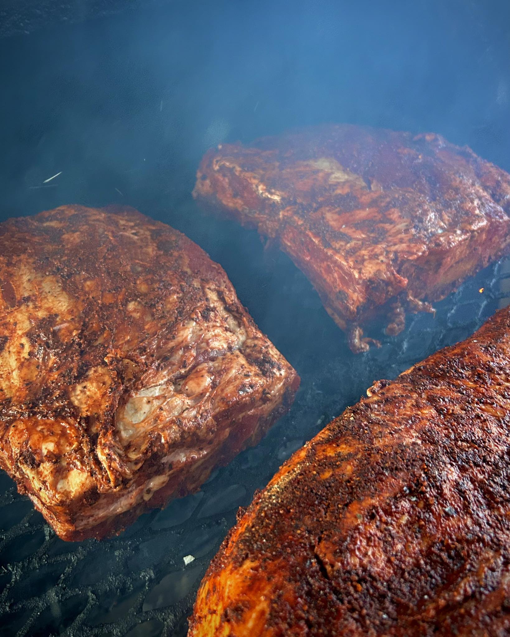 Dino ribs smoking at The Pit BBQ in Riverside, Wyoming