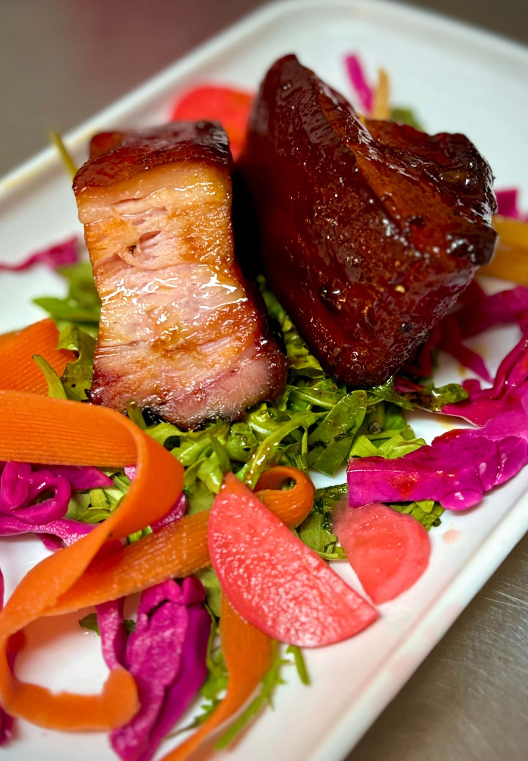 Pork belly special with pickled vegetables at The Pit BBQ